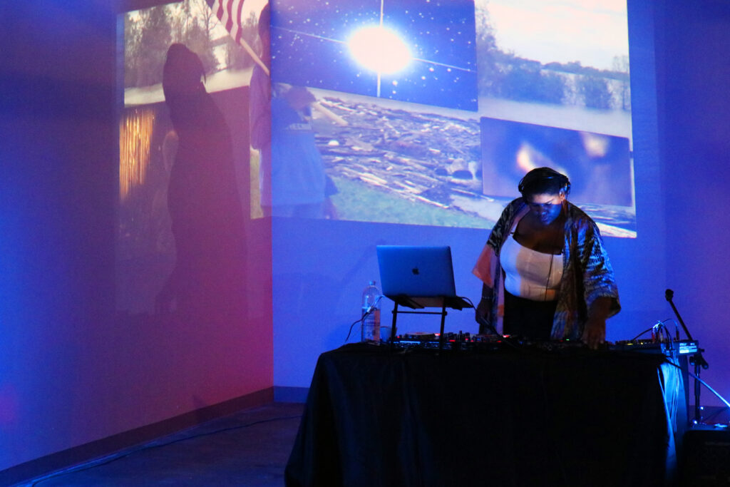 person playing music with video projections