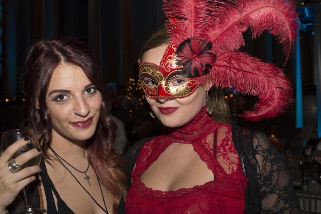 two students in costume at beaux arts ball