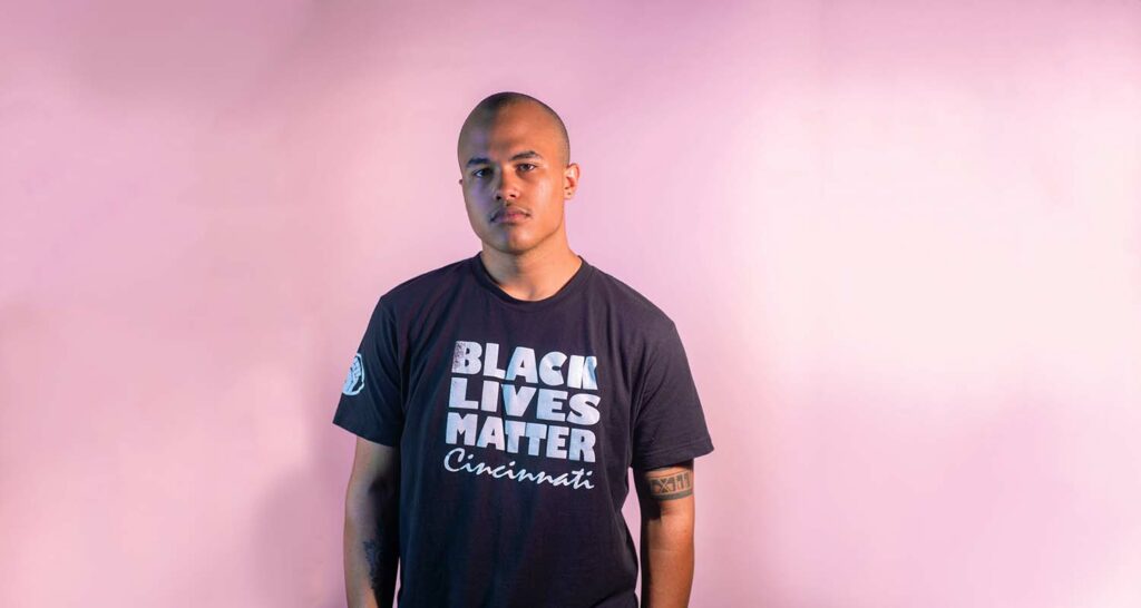 student posing in Black Lives Matter shirt