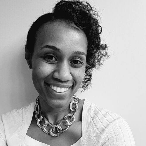 black and white headshot of woman