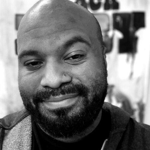 black and white headshot of man