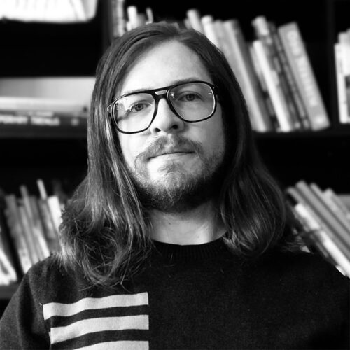 black and white headshot of man