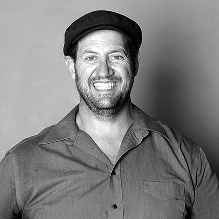 black and white headshot of man