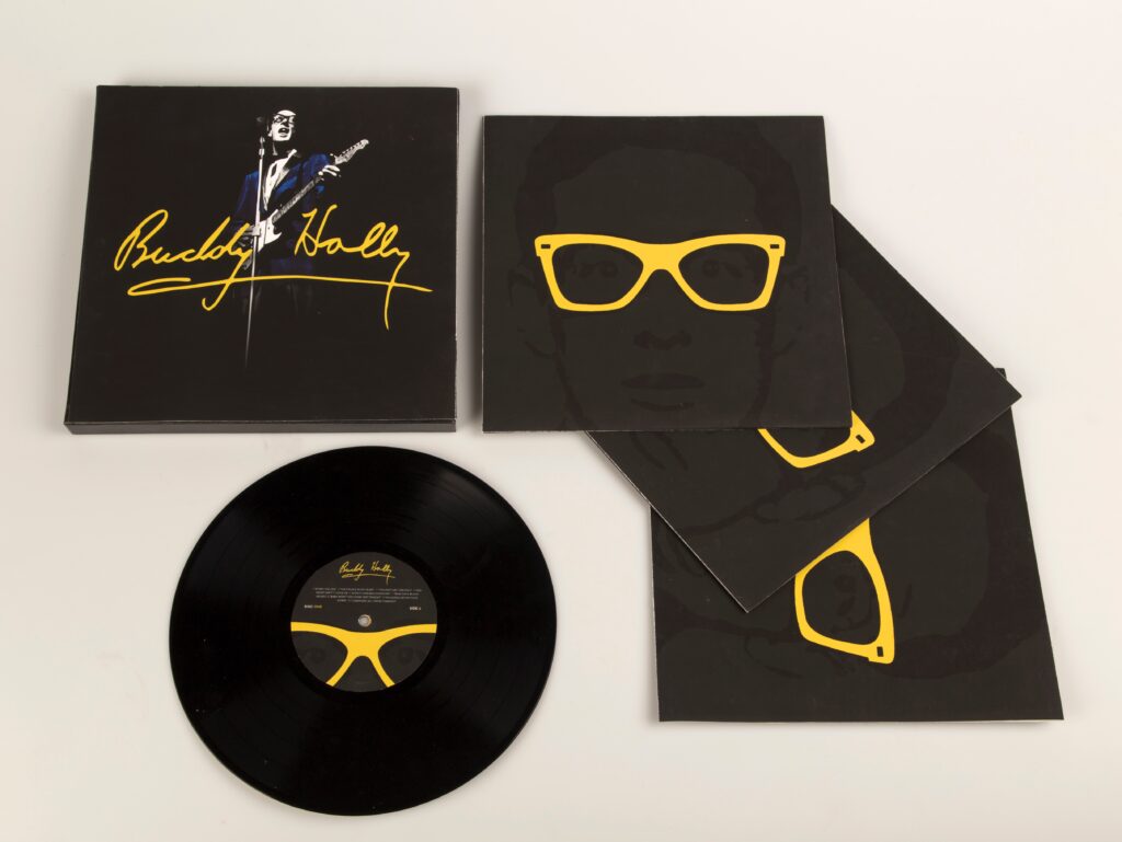 package design for buddy holly records in black and yellow