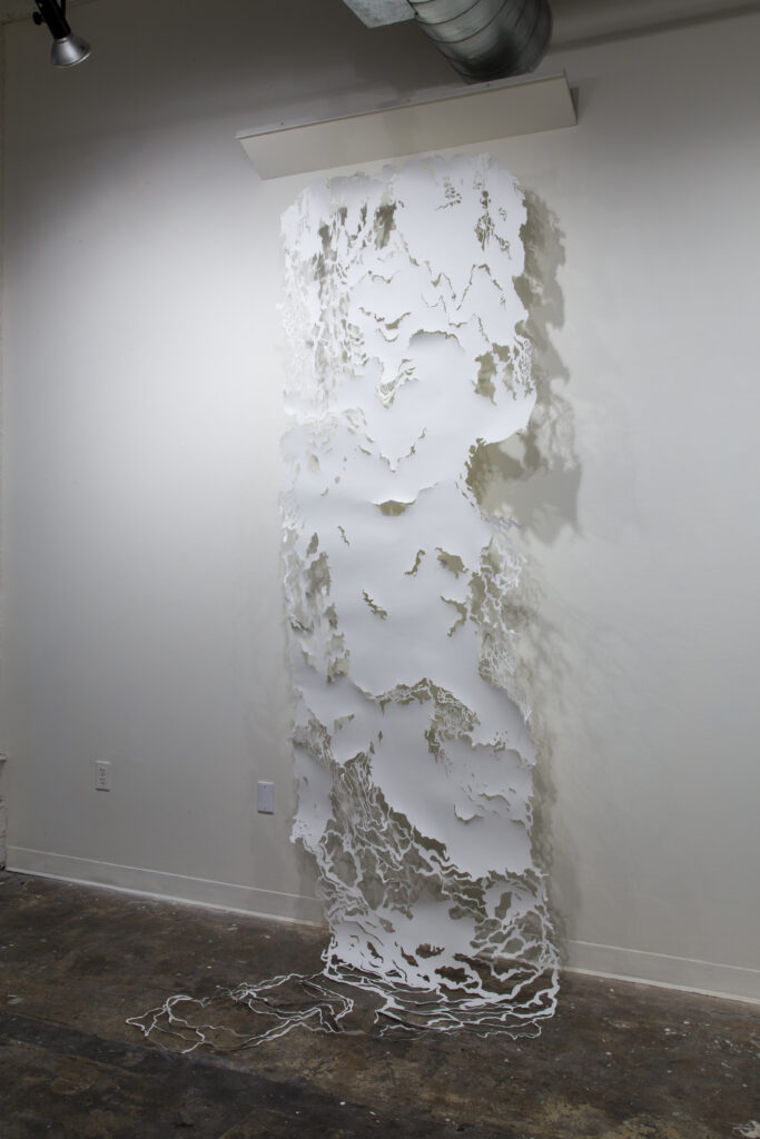 cut paper scroll in gallery