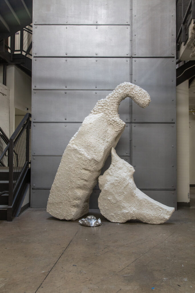 two large abstract plaster sculptures