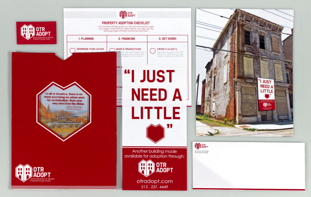 stationary graphic layouts with building and text reading "i just need a little (heart icon)" in red