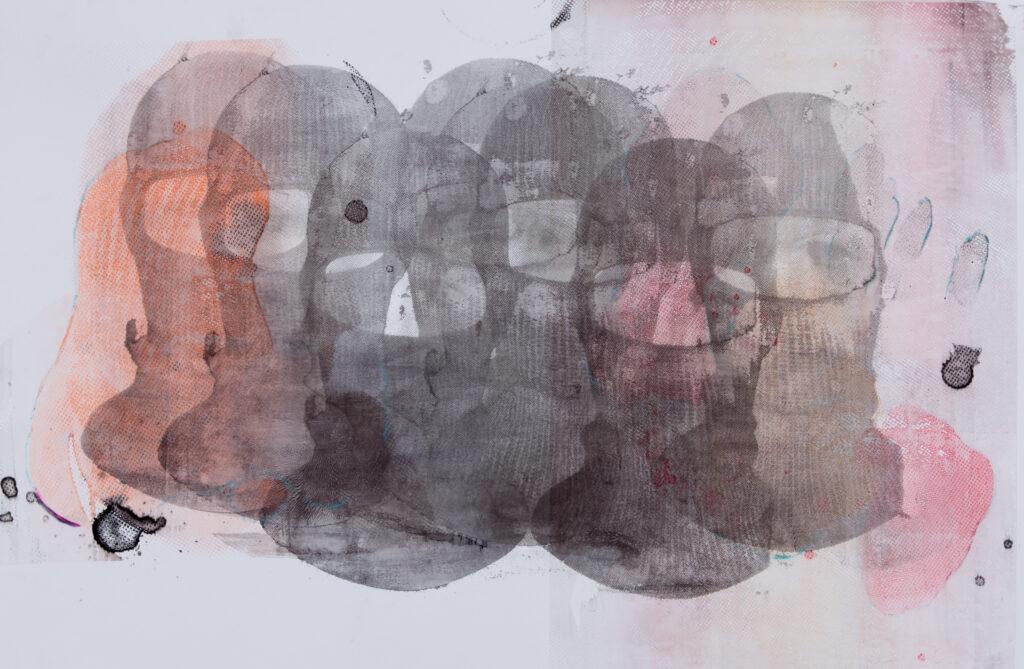 print of overlapping repeated image of a head in a ski mask