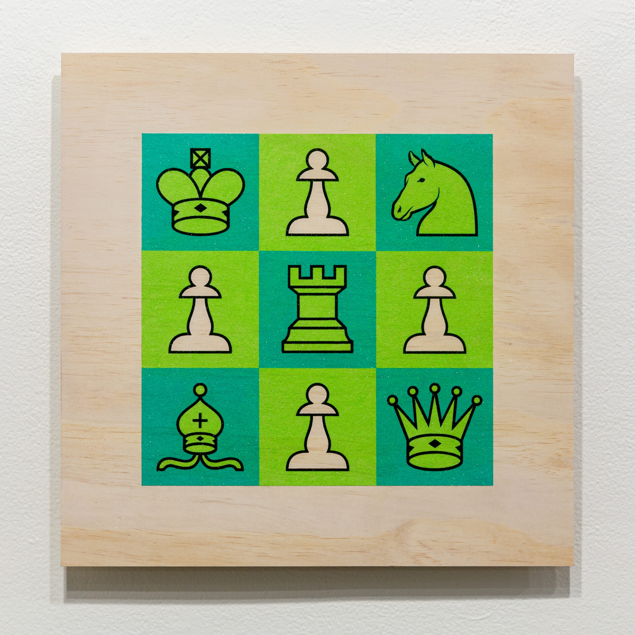 green and teal graphic chess print on panel