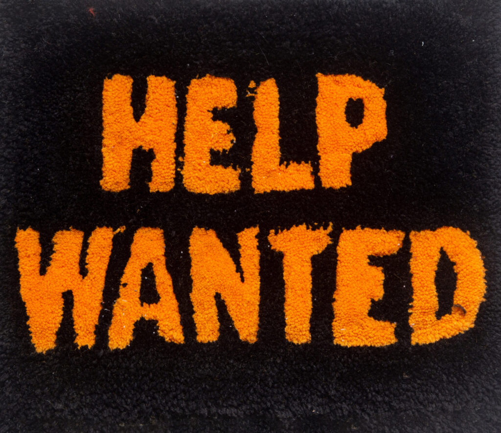 tufted help wanted sign
