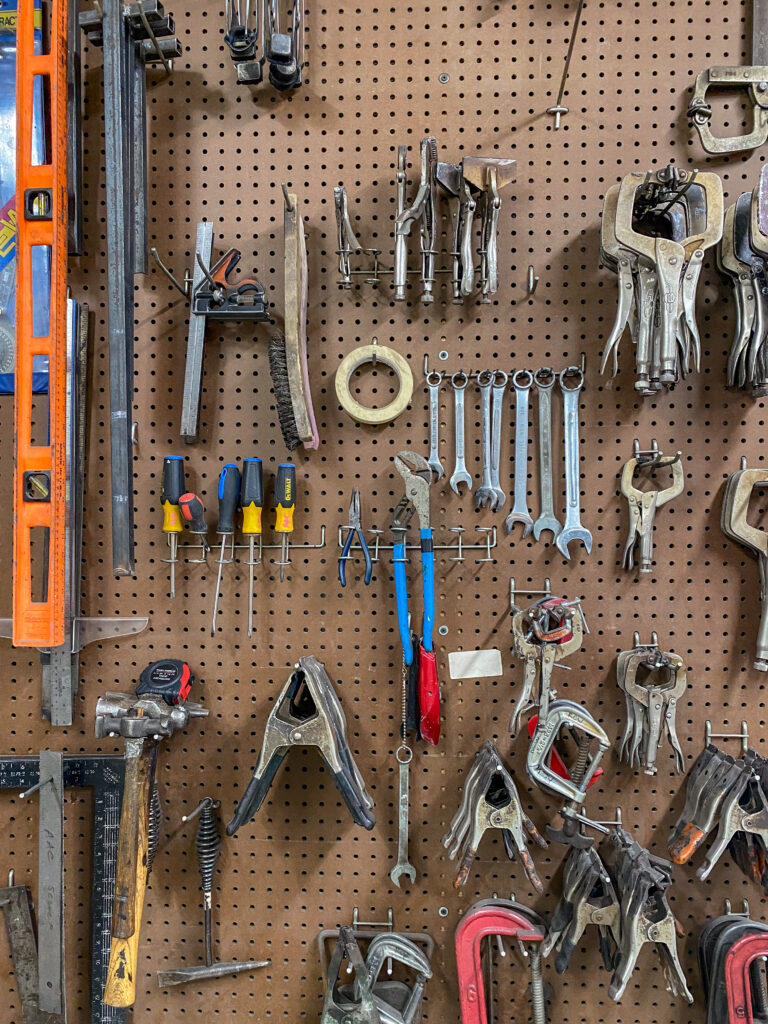 hand tools on peg board