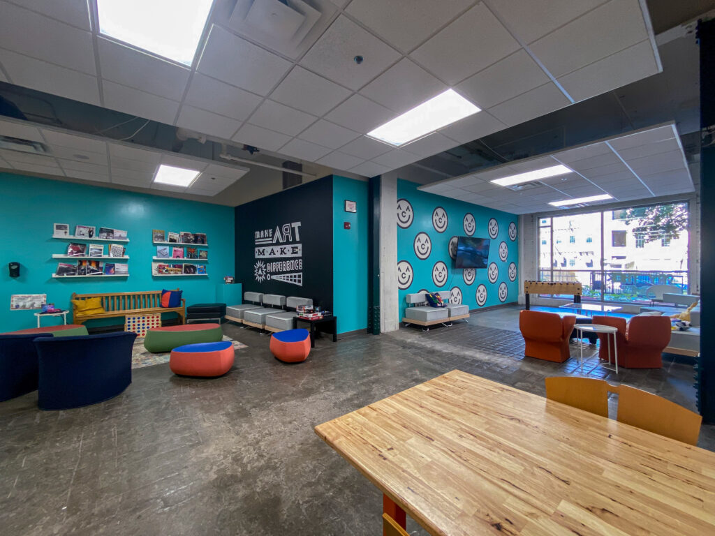 common space with chairs tables and couches