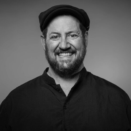 black and white headshot of man