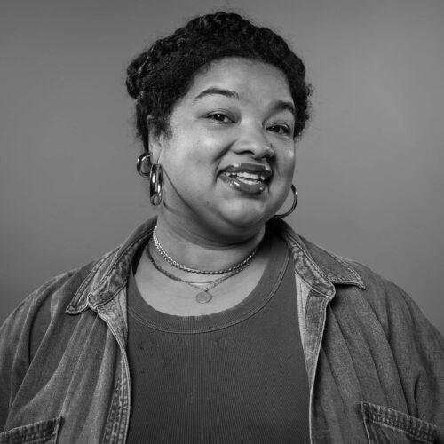 Portrait of woman with gold hoop earrings
