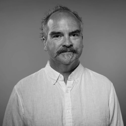 black and white headshot of man