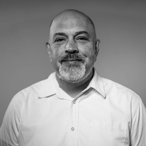 black and white headshot of man