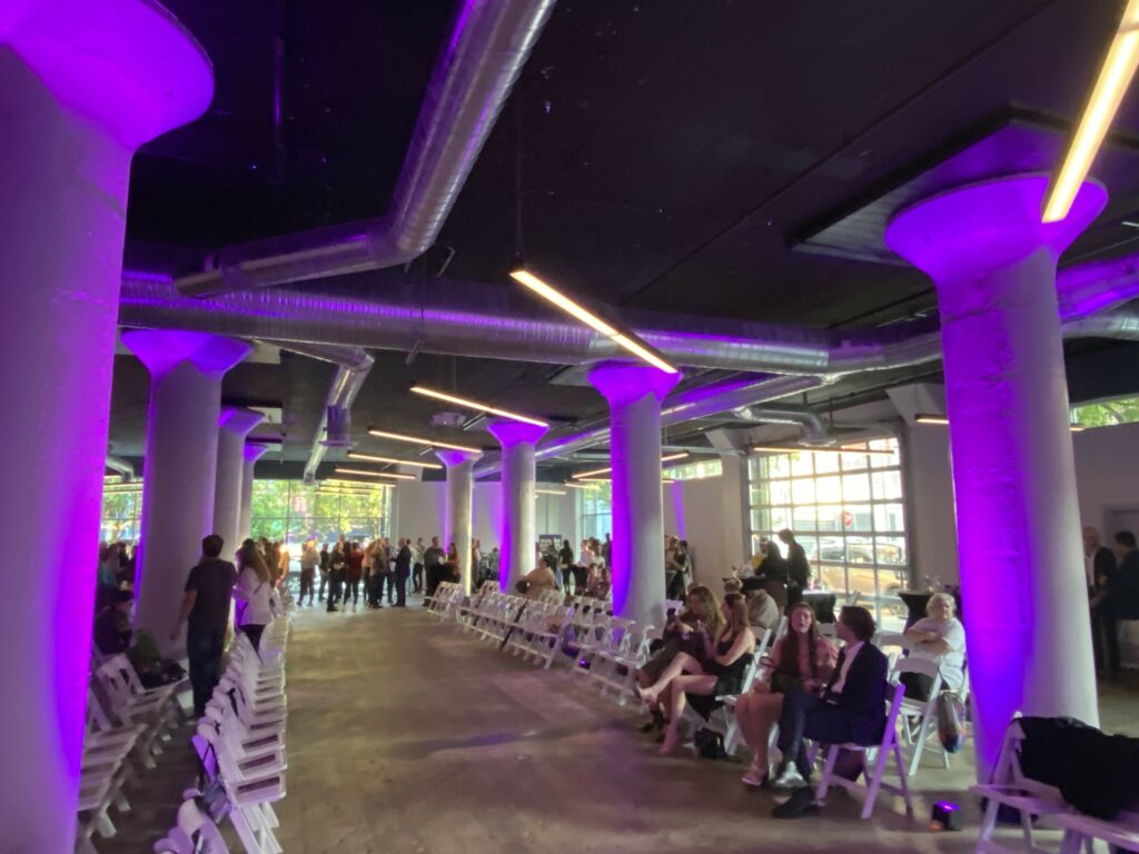 Guests begin seating for the HRC Project Rainbow Fashion Show in SITE1212 at the Art Academy of Cincinnati.