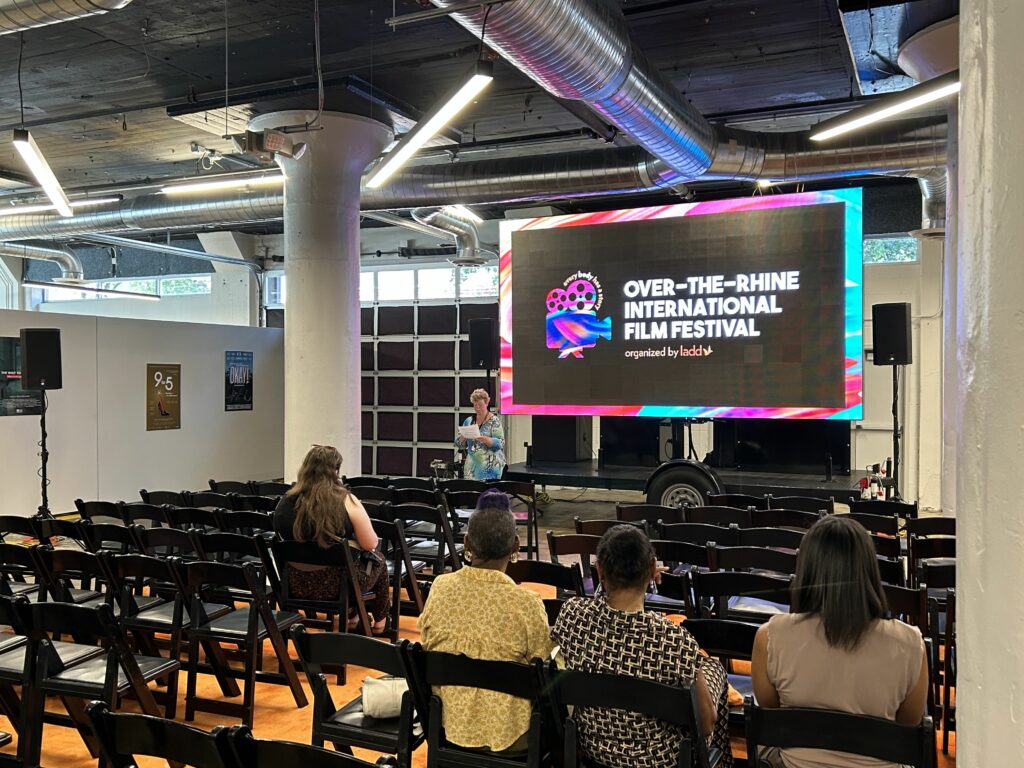 A filmmaker speaks to the audience before their film begins at the 2023 OTR Film Festival in SITE1212 at the Art Academy of Cincinnati.