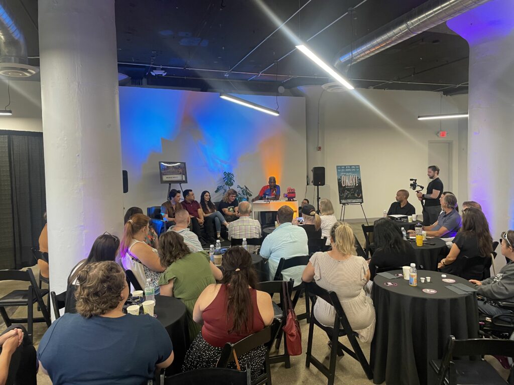 A crowd listens to a panel of filmmakers at the 2023 OTR Film Festival in SITE1212 at the Art Academy of Cincinnati.