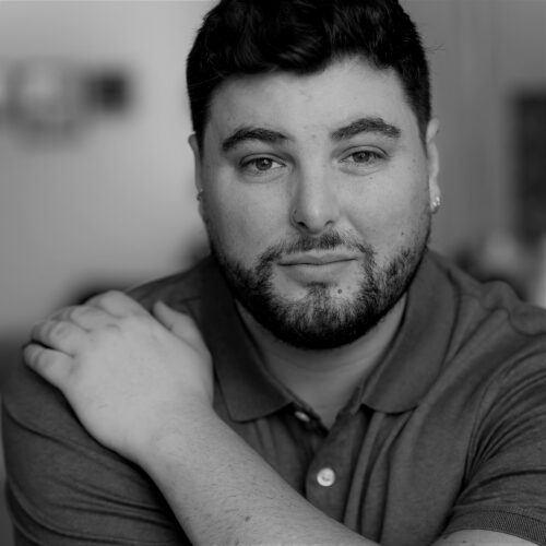 Man with beard looking at camera