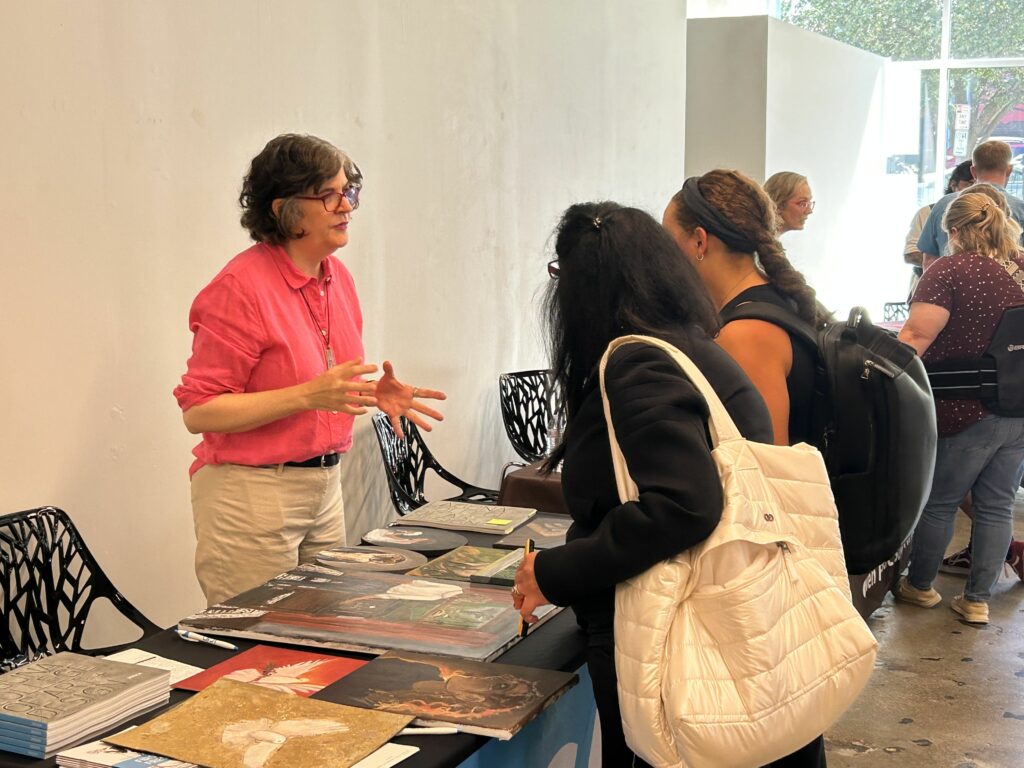 Attendees of the 2023 National Portfolio Day speak to arts colleges from across the country.