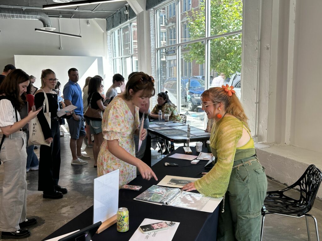 Attendees of the 2023 National Portfolio Day speak to arts colleges from across the country.