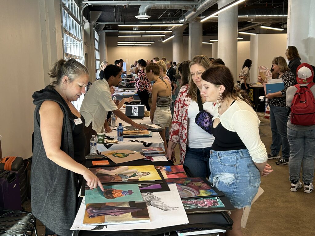 Attendees of the 2023 National Portfolio Day speak to arts colleges from across the country.