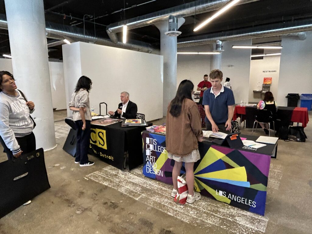 Attendees of the 2023 National Portfolio Day speak to arts colleges from across the country.