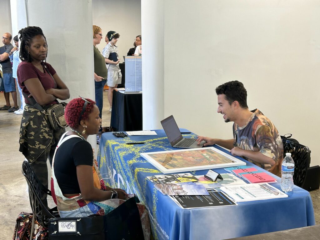 Attendees of the 2023 National Portfolio Day speak to arts colleges from across the country.