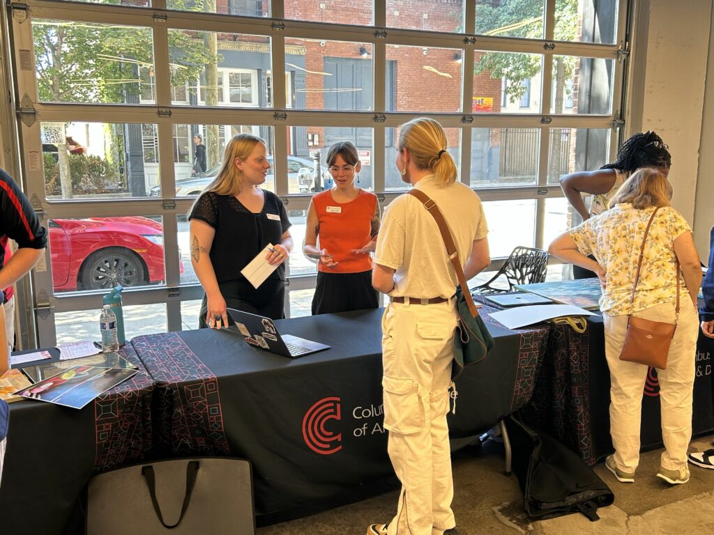 Attendees of the 2023 National Portfolio Day speak to arts colleges from across the country.