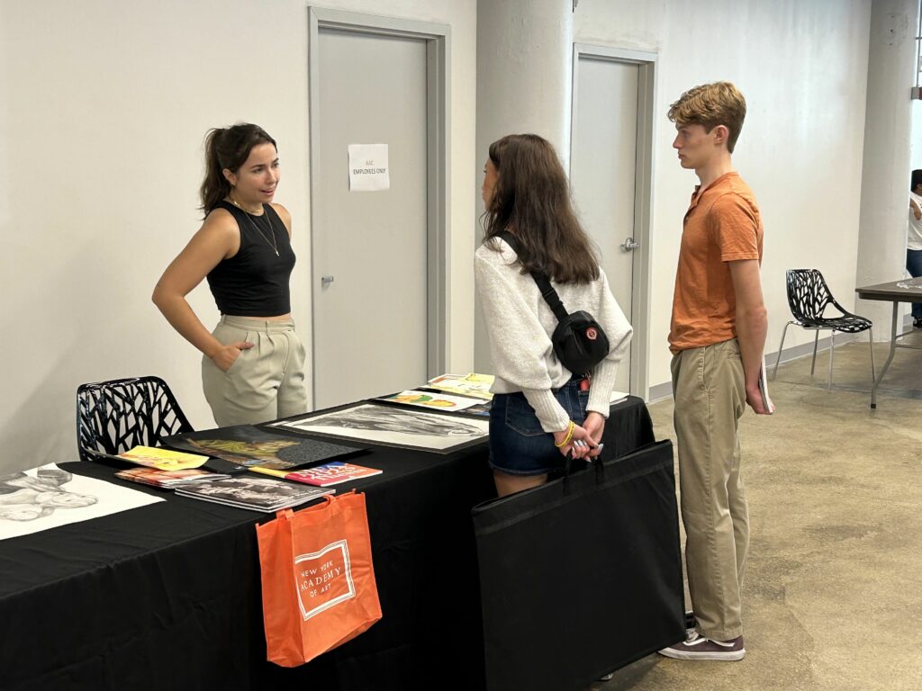 Attendees of the 2023 National Portfolio Day speak to arts colleges from across the country.