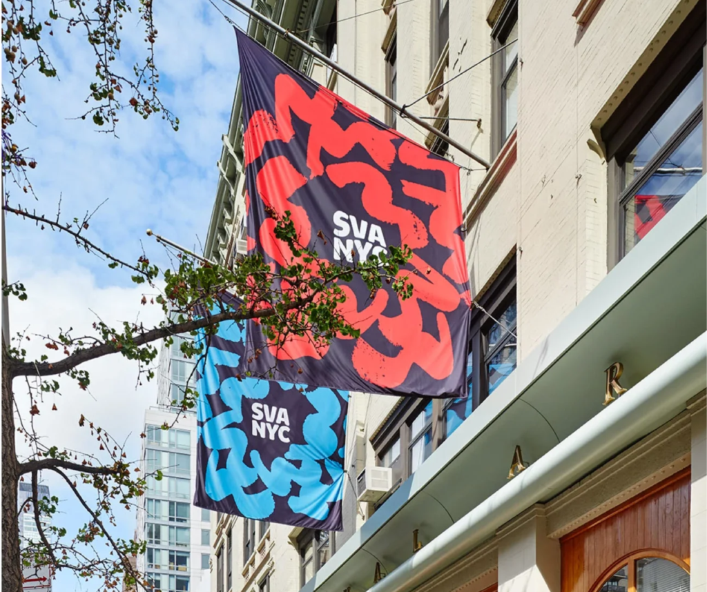 two flags hanging on a building in New York City