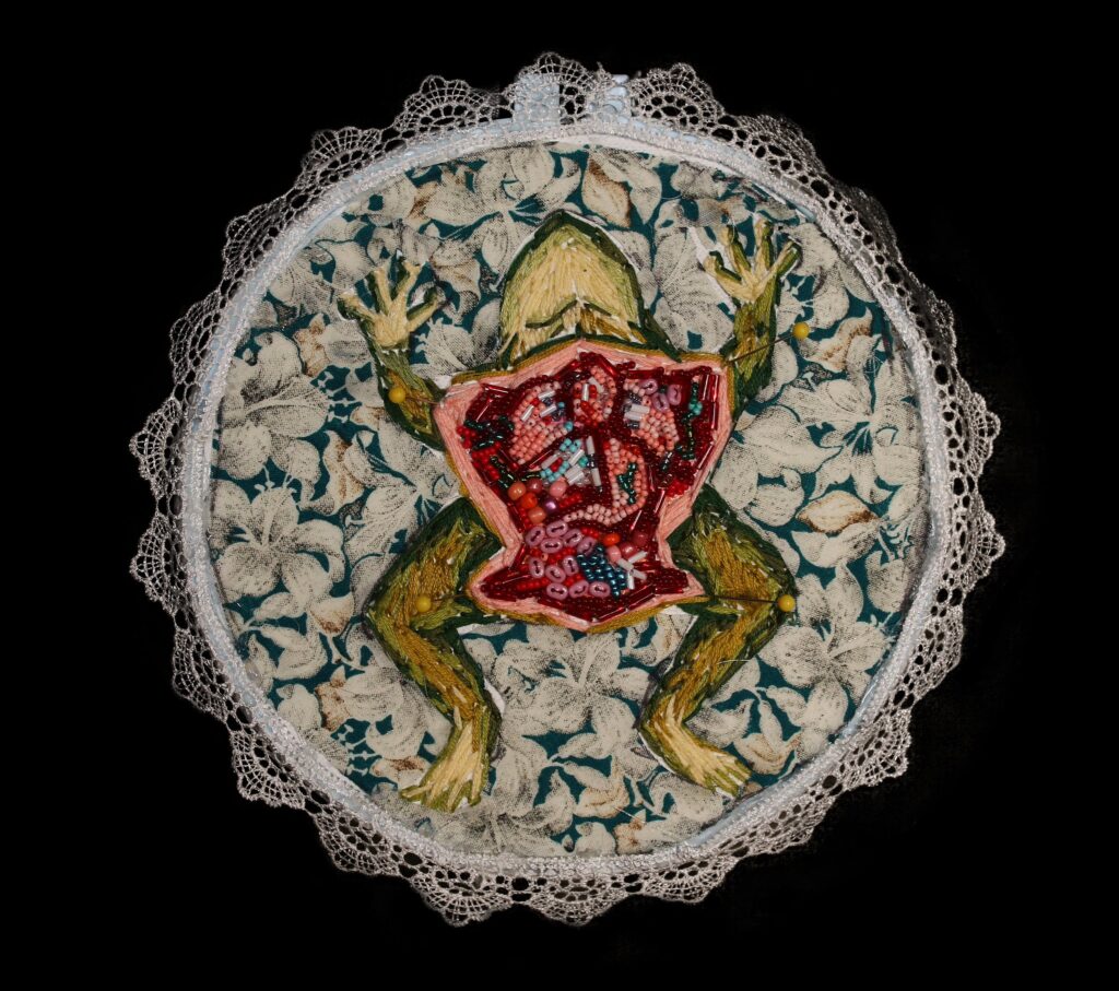 beaded image of a splayed frog