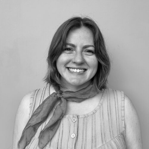 black white portrait of a young woman smiling