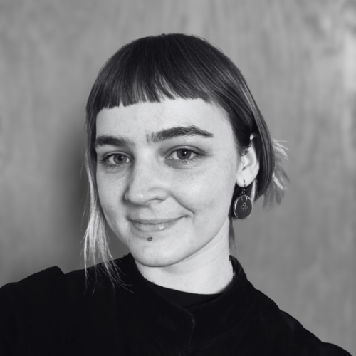 black white portrait of a young woman smiling