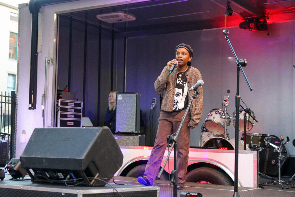A student is at a microphone.